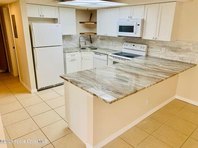 1648 Sunny Brook Ln, Unit M202, Palm Bay, FL 32905 | MLS #1073