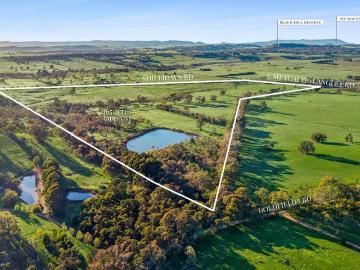 165 Acres with Scale, Water and Historic Charm