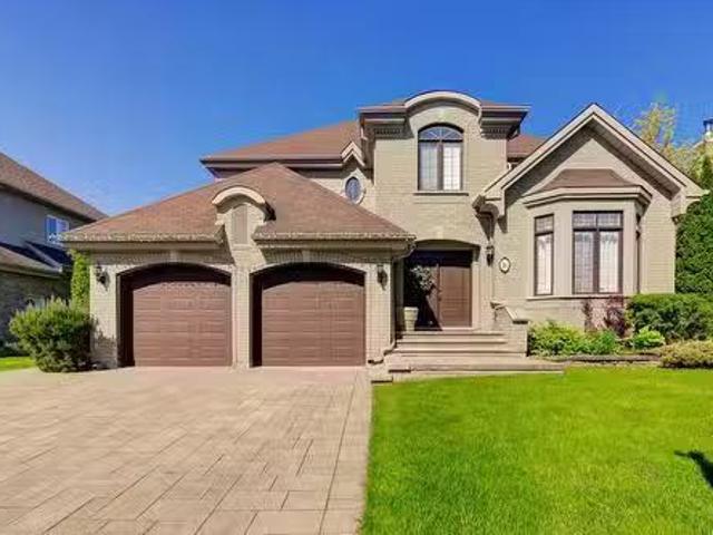 16 Crois. Des Cèdres, Kirkland, QC, H9J 4A6 house for sale.