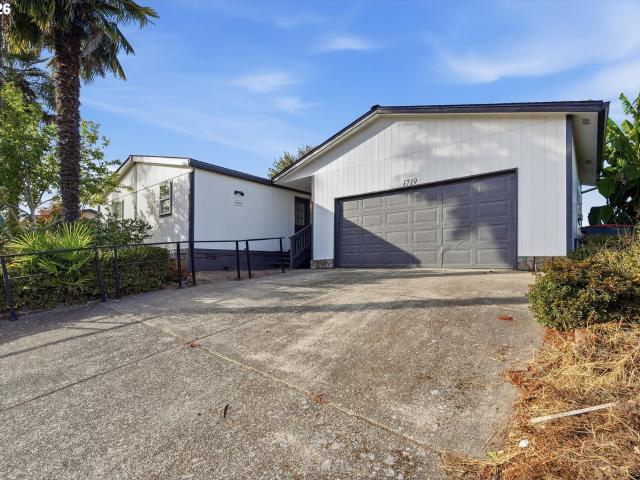 1719 nw poppy hills dr