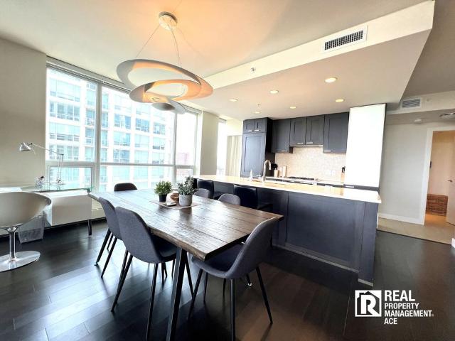 1723 | Executive Furnished 2 Bed + Den + 2 Bath | Waterfront | Downtown