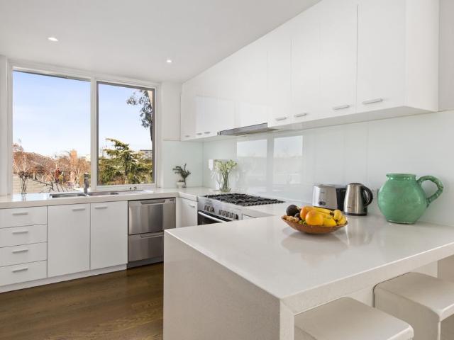 FULLY FURNISHED sunny corner apartment in this very secure, boutique block