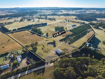 18.9 Acres of Pure Potential: Premium Rural Living with Three Road Frontages