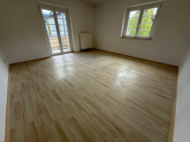 1. OG mit Laminat und Balkon im Heimgarten
