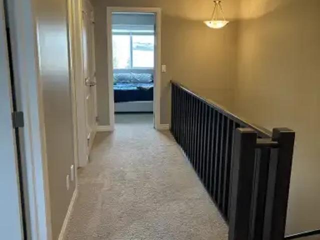 1 Bedroom Apartment Cochrane AB 104711470