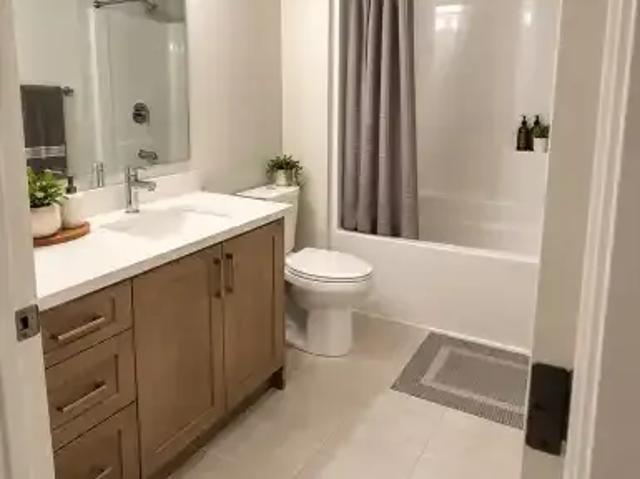 1 Bedroom Apartment Cochrane AB 105623571