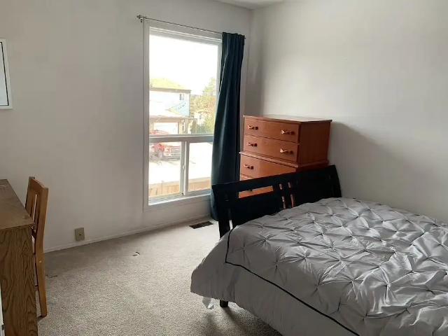 1 Bedroom available Any Gender Shared living area in 4 bedroom condo