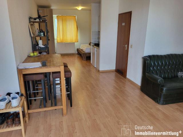 1 Zimmer Wohnung im Dachgeschoss mit Küche, Tiefgarage und Dachterrasse