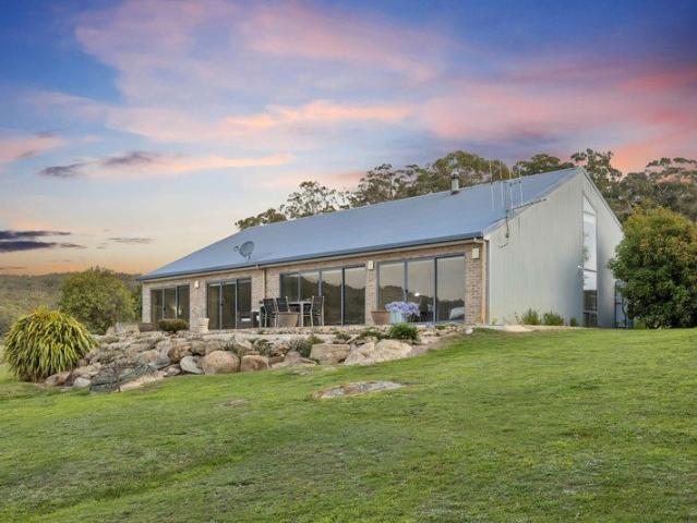 1,260 Acres of High Country Grazing with Permanent Water and Architectural Homestead