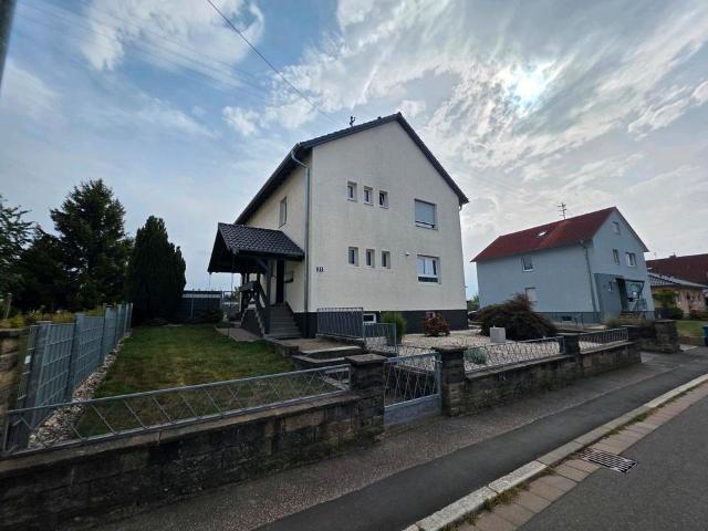 1 2 Familienhaus in guter Lage und Idyllischem Ausblick