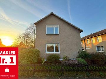 1 2 Familienhaus in TOP Wohnlage