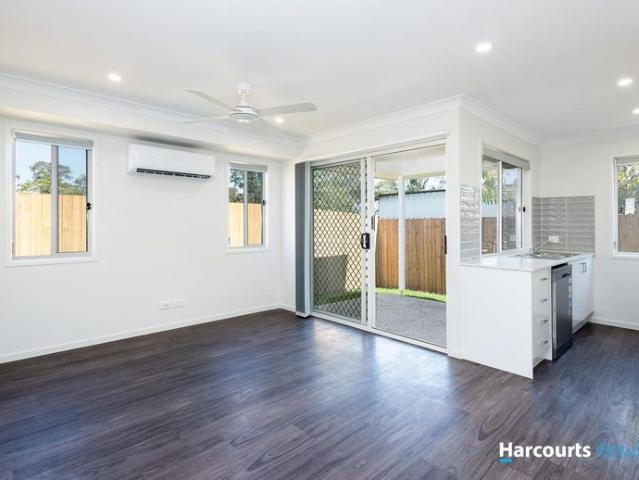 As New 1 year old duplex with solar power, side access to back yard