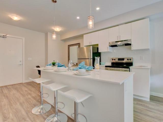 200 Central Rentals A207 1 bedroom plus den Apartment for Rent