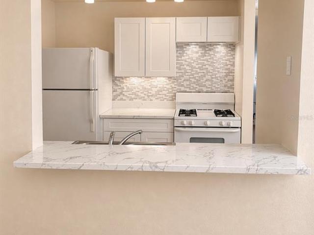 2035 Dixie Belle Dr, Unit 2035M, Orlando, FL 32812 | MLS #G5099