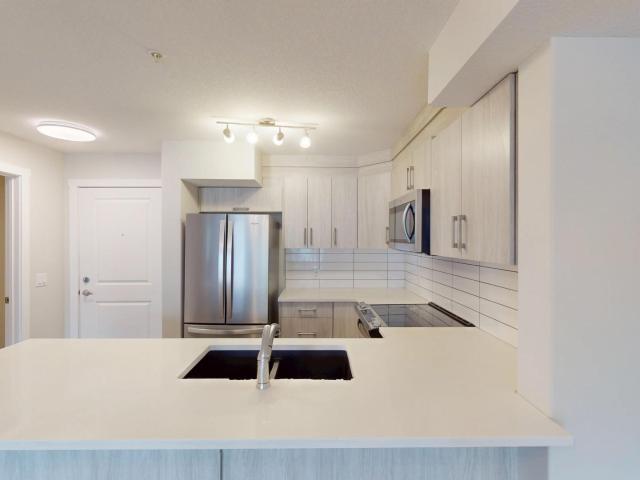 2102, 6118 80 AVE NE 2 Beds Condo for Rent