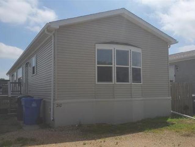 210 Brownlee Street, Weyburn, SK, S4H 3P4 house for sale | Listing ID SK046688 | Royal LePage
