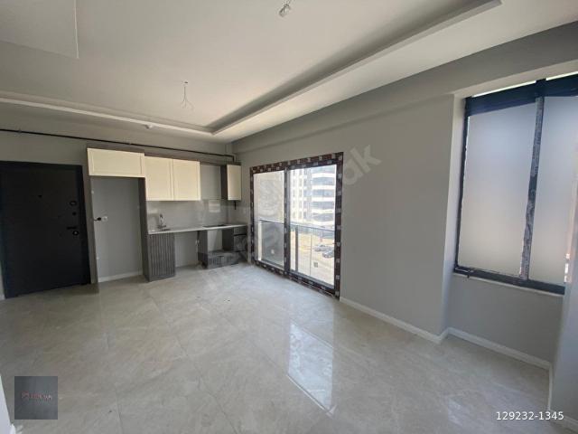 2+1 MEZİTLİ MERKEZ'DE TAPU CİV. KİRALIK SIFIR DAİRE.