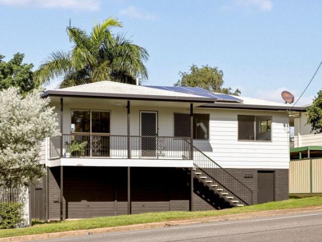 223 Blackstone Road, Silkstone, QLD Elevated three bedroom home with spacious living, large backyard and versatile downstairs retreat