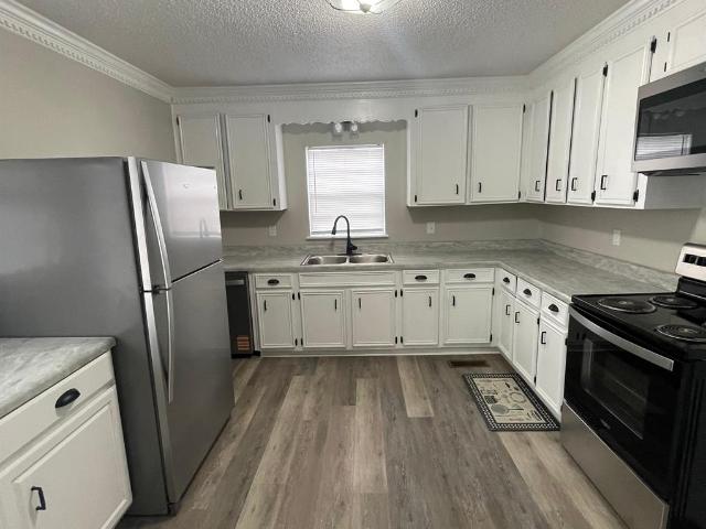 228 Becca Lane, 3 beds, 1 full and 1 half bath