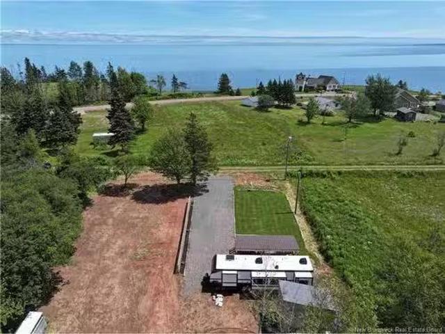 22 Allee Croix Rouge, Bas Cap Pele, NB, E4N 1L5 vacant land.