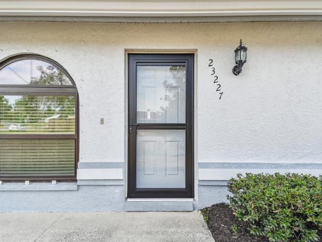 23227 Club Villas Dr, Unit 38, Land O' Lakes, FL 34639 | MLS #TB8347