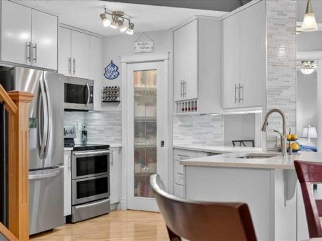 248 Springbank Villas Sw, Calgary, AB, T3H 5P7 semi detached for sale | Listing ID A2351 | Royal LePage