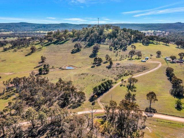 25 ACRES OF SERENITY, YOUR FOREVER HOME AWAITS