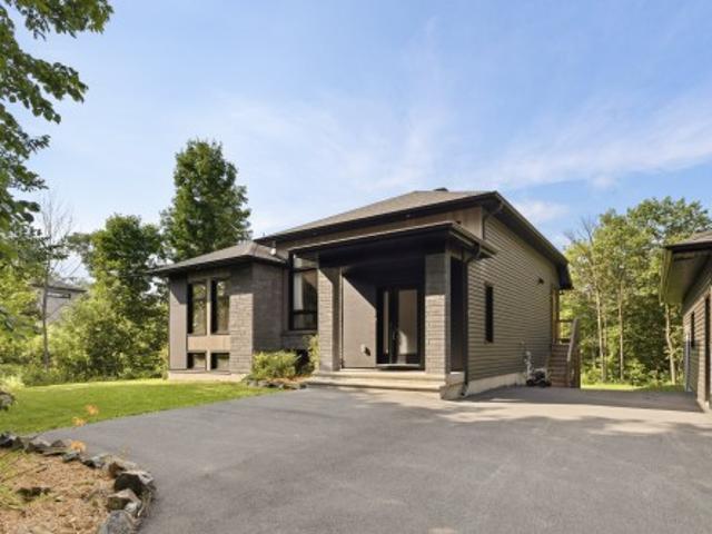 25 Ch. Des Roseaux, L'Ange Gardien, QC, J8L 0B8 house for sale | Listing ID 10985 | Royal LePage