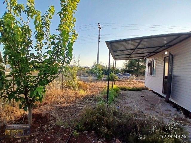 264M2 İMARLI ARSA ICERİSİNDE NUMARATAJLI SU ABONELİ PRAFABRIK EV