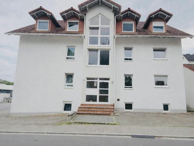 2 Mehrfamilienhäuser + Nebengebäude • 14 Wohnungen • 980 m² WF