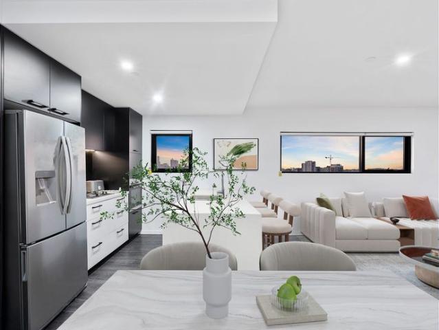 2 bed, 2 bath, 2 garage spaces with CBD views, ducted AC/heating, 3 minute walk to PA Hospital, shops/dining and transport