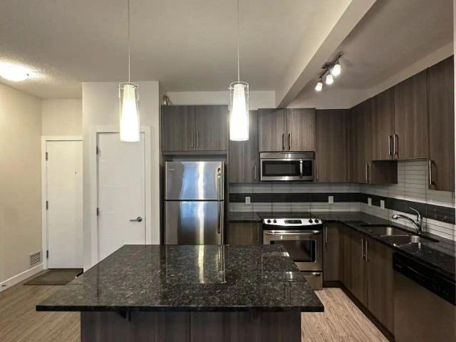 2 Bed + Den & 2 Bath in Sage Hill — 2 Bedrooms+ Den Condo Unit