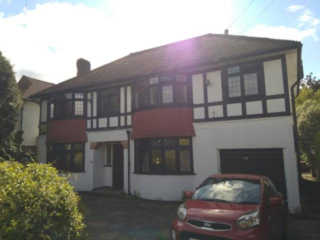 2 bed flat in a detached house
