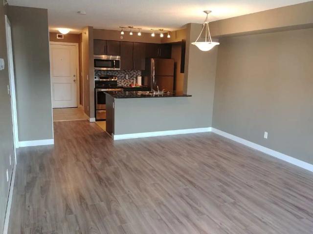 2 BEDROOM CONDO IN AIRDRIE* Top Floor — 2 Bedrooms Apartment