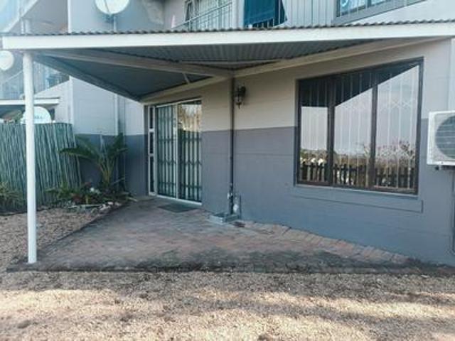 2 bedroom corner ground floor unit i.