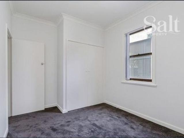 2 bedroom apartment footsteps to the beach