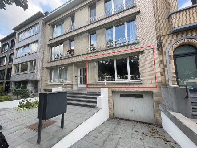 2 bedroom apartment, little garden, covered parking, and 2 s