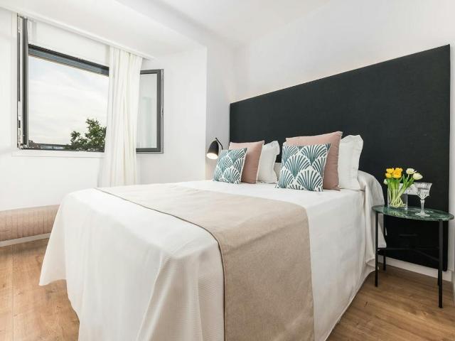 2 Bedroom Apartment with Rooftop Terrace in Gràcia, Barcelona Amsterdam Apartments for Rent