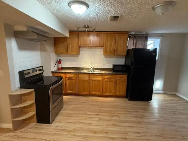 2 bedroom Basement Suite, 56 Everwillow Green SW
