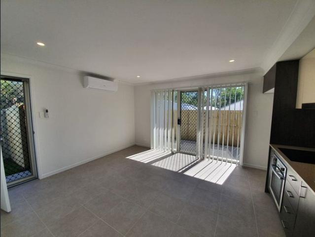 2 BEDROOM DUPLEX WITH OPEN KITCHEN LIVING AND EASY TO MAINTAIN YARD. GOOD SIZED BEDROOMS