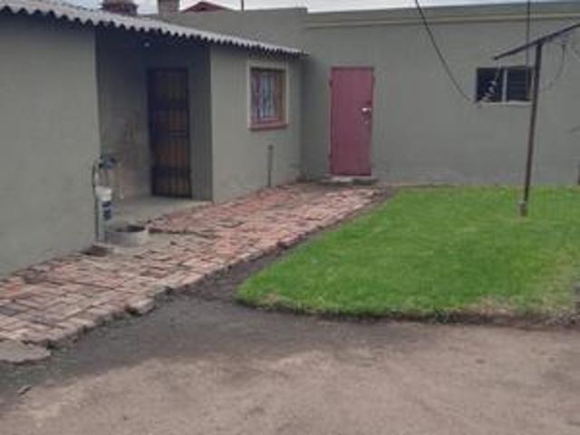 2 bedroom house with backrooms at kw.