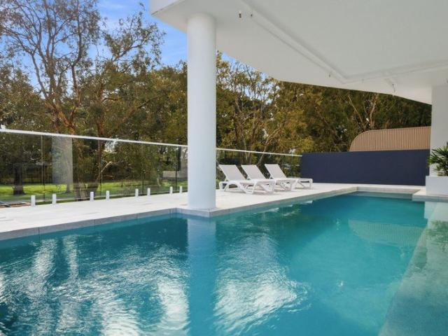 2 bedroom PLUS multipurpose room overlooking the park