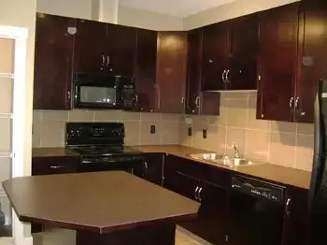 2 Bedroom Townhouse Cochrane AB 105087946