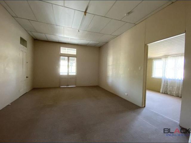 2 Bedroom Unit, Great Location, No Yard Maintenance