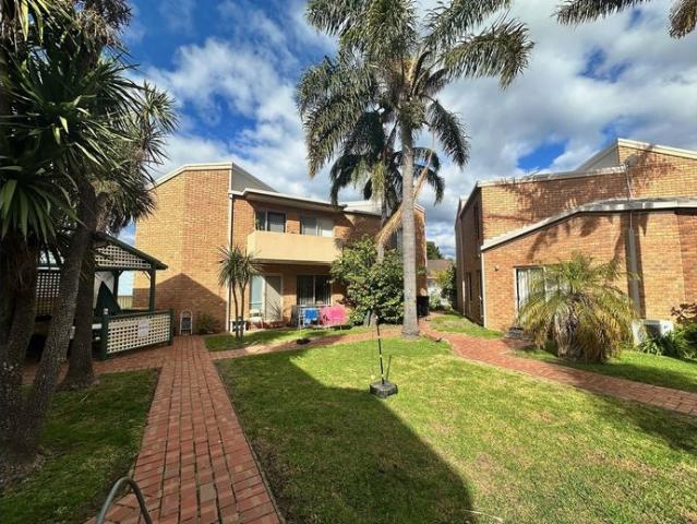2 bedroom unit stone throw away from town!