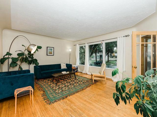 2 BR + FULL BATH | MAIN FLOOR | IN SUITE LAUNDRY| CLOSE TO GROCERY, SCHOOL, LRT