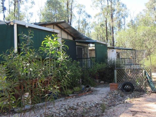 2 Containers decked out with a small amount of furniture included