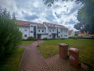 2 Häuser mit 11 ETW und Nebengelass + Baugrundstück