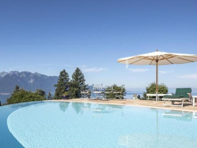 2 Immobilien, darunter ein luxuriöses Chalet mit Panoramablick