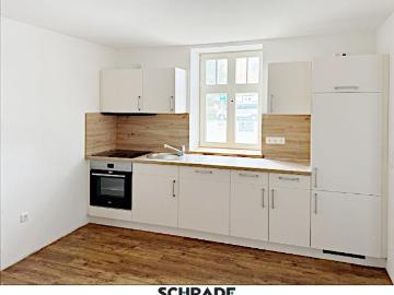 2 Raum Wohnung im Erdgeschoss und mit Einbauküche im Herzen der Stadt